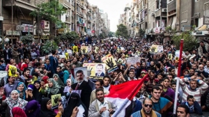 Tổ chức Anh em Hồi giáo ủng hộ Tổng thống bị phế truất Mohamed Morsi tại Al-Matareya, ngoại ô Cairo (Ảnh: Tân Hoa xã)