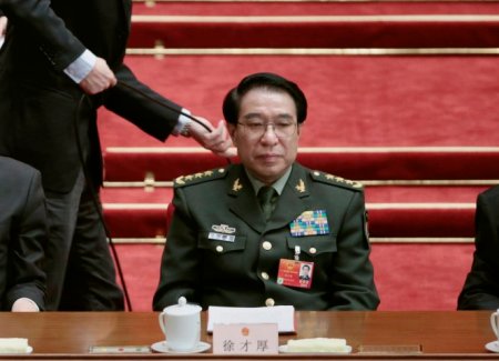 Vice Chairman of China's Central Military Commission Xu Caihou attends the closing ceremony of the China's parliament in Beijing
