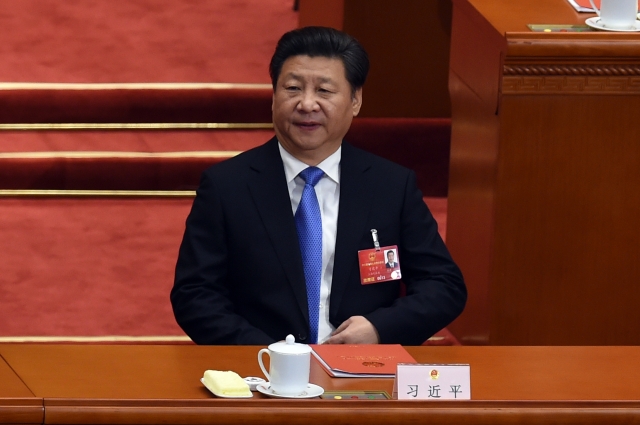 Học giả cho rằng, người lãnh đạo Trung Quốc hiện thời đang cố gắng gọt bỏ bớt quyền lực của “Đảng”, tăng cường sức mạnh cho “Chính phủ”, rất có thể trong tương lai Trung Quốc sẽ chuyển sang thể chế Tổng thống. (AFP)